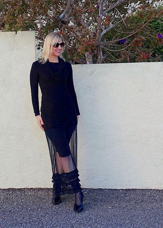 all black leggings, long sleeve top and a sheer maxi skirt