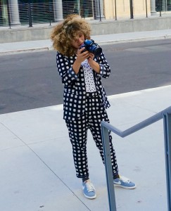 a sharp suit and sneakers