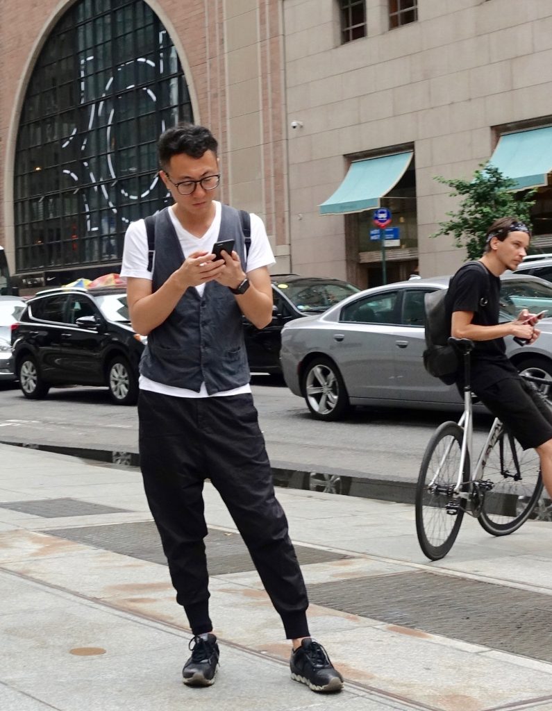 man at Bill Cunningham Corner