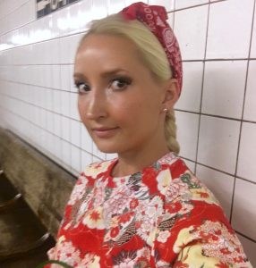 Liliya's red & green outfit in the subway