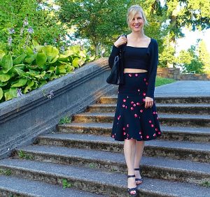 flattering crop top - midi skirt walking down stairs