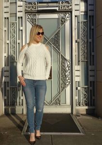 Cold shoulder sweater with distressed jeans