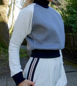 Close up of Layana Aguilar sweatshirt, Rachel Zoe pants