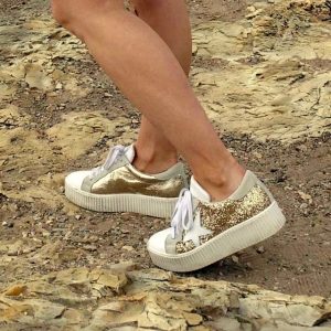 Gold sneakers with stars