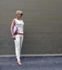 White outfit with pink accessories
